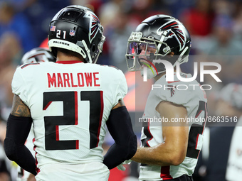Safety Erik Harris (23) of the Atlanta Falcons talks with safety Dean Marlowe (21) of the Atlanta Falcons during a break in play during an N...
