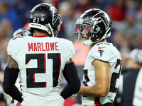 Safety Erik Harris (23) of the Atlanta Falcons talks with safety Dean Marlowe (21) of the Atlanta Falcons during a break in play during an N...