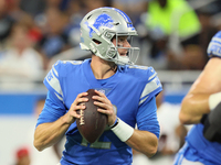 Quarterback Tim Boyle (12) of the Detroit Lions looks to pas the ball during an NFL preseason football game between the Detroit Lions and th...