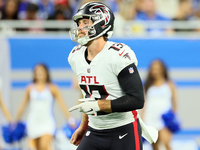 Punter Bradley Pinion (13) of the Atlanta Falcons runs on the field after punting to the Detroit Lions during an NFL preseason football game...