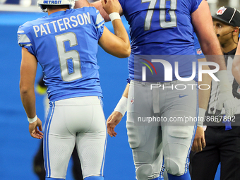 Place kicker Riley Patterson (6) of the Detroit Lions is congratulated by offensive tackle Dan Skipper (70) of the Detroit Lions after makin...
