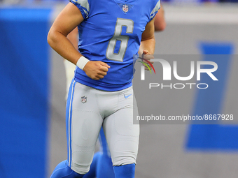 Place kicker Riley Patterson (6) of the Detroit Lions runs on the field during an NFL preseason football game between the Detroit Lions and...