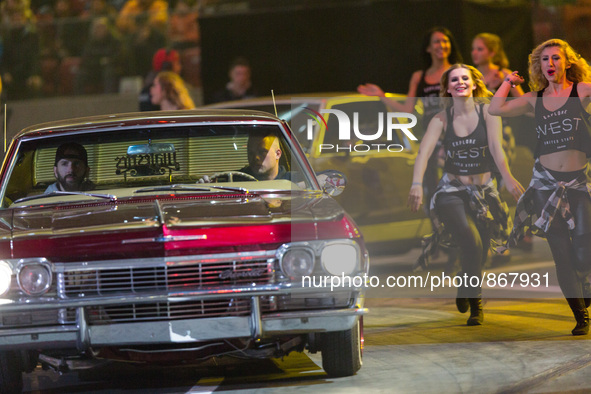 Lowriders race during the VERVA Street Racing at the National Stadium on October 24, 2015 in Warsaw, Poland. 
