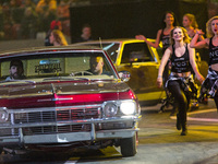 Lowriders race during the VERVA Street Racing at the National Stadium on October 24, 2015 in Warsaw, Poland. (