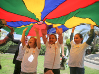 Palestinians participate in a fun day as part of community mental health programs after the latest conflict between Israel and Palestinian m...