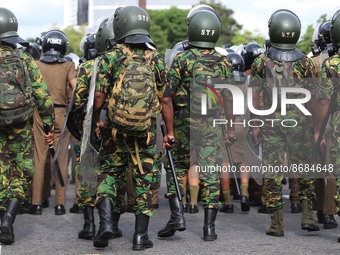 Sri Lankan military stands guard during the Inter-University Student Federation protest against the government of President Ranil Wickremesi...