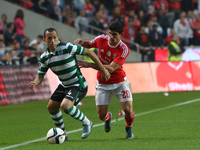 Sporting's defender Jefferson (L ) vies with Benficas forward Gonalo Guedes during the Portuguese League football match SL Benfica vs Sporti...