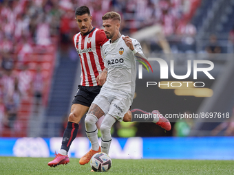 Samu Castillejo Right Winger of Valencia and Spain and Yuri Berchiche Left-Back of Athletic and Spain compete for the ball during the La Lig...