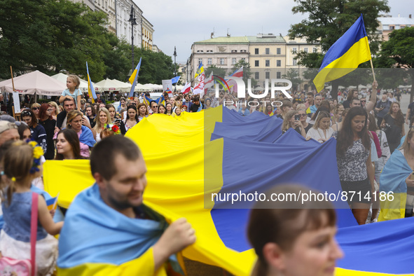 People attend a demonstration on Independence Day of Ukraine at the Main Square in Krakow, Poland on  August 24, 2022. The day marks the 31s...