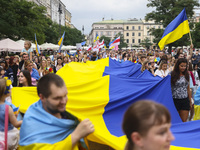 People attend a demonstration on Independence Day of Ukraine at the Main Square in Krakow, Poland on  August 24, 2022. The day marks the 31s...