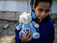 A migrant girl in a camp in Kos, Greece, on October 27, 2015. More than 700,000 refugees and migrants have reached Europe's Mediterranean sh...