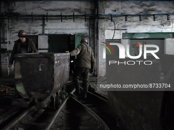 Photo from the archive. Miners push carts at the Privolnyanskaya coal mine. Small town of Privolye, Eastern Ukraine, Thursday, November 13,...