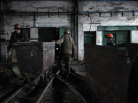 Photo from the archive. Miners push carts at the Privolnyanskaya coal mine. Small town of Privolye, Eastern Ukraine, Thursday, November 13,...