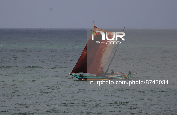Sri Lankan fishermen use sailing boat for fishing in Negombo, Sri Lanka on August 29, 2022. 