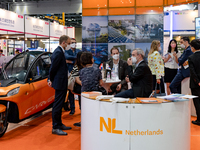 Visitors look at a exhibition booth displayed by Netherlands during the World Smart City Expo 2022 in KINTEX(Korea International Exhibition...
