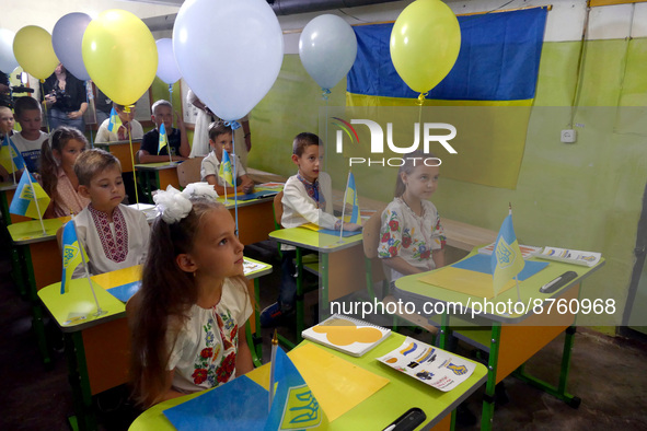 ODESA, UKRAINE - SEPTEMBER 1, 2022 - Children displaced by the war sit at the desks decorated with balloons during a celebration organised b...