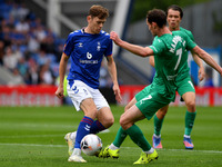 Ben Tollitt of Oldham Athletic tussles with Liam Mandeville of Chesterfield Football Club during the Vanarama National League match between...