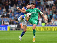 Nathhan Sheron of Oldham Athletic tussles with Joe Quigley of Chesterfield Football Club during the Vanarama National League match between O...