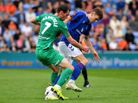 Ben Tollitt of Oldham Athletic tussles with Liam Mandeville of Chesterfield Football Club during the Vanarama National League match between...