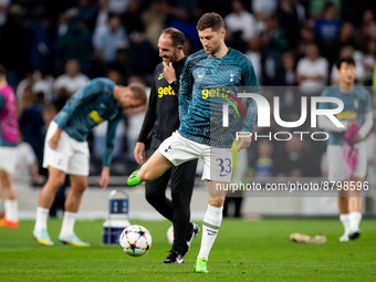Ben Davies of Tottenham warms up during the UEFA Champions League match between Tottenham Hotspur and Olympique de Marseille at White Hart L...