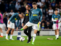 Ben Davies of Tottenham warms up during the UEFA Champions League match between Tottenham Hotspur and Olympique de Marseille at White Hart L...