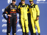 Max Verstappen of Red Bull Racing, Charles Leclerc and Carlos Sainz of Scudera Ferrari after taking pole position by Leclerc during the Form...
