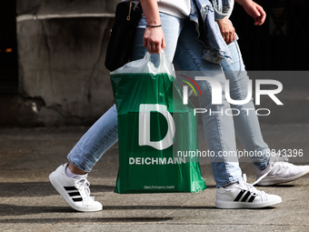 A person carries Deichmann bag in Krakow, Poland on September 13, 2022. (