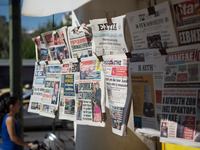 Newspapers are hanging on a kiosk in the center of Athens, Greece on September 14, 2022. (