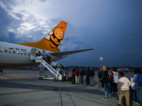Passengers are boarding Buzz boeing 737 at John Paul II International Krakow Airport in Balice, Poland on September 8, 2022. (