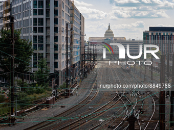 The U.S. Capitol is seen beyond commuter and freight railway tracks in Washington, D.C. on September 14, 2022 as a potential nationwide labo...