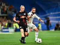 Xaver Schlager and Daniel Carvajal during UEFA Champions League match between Real Madrid and RB Leipzig at Estadio Santiago Bernabeu on Sep...
