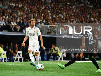 Luka Modric and Christopher Nkunku during UEFA Champions League match between Real Madrid and RB Leipzig at Estadio Santiago Bernabeu on Sep...