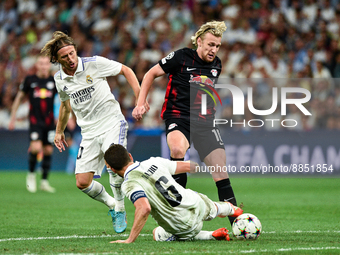 Emil Forsberg, Nacho and Luka Modric during UEFA Champions League match between Real Madrid and RB Leipzig at Estadio Santiago Bernabeu on S...
