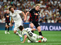 Emil Forsberg, Nacho and Luka Modric during UEFA Champions League match between Real Madrid and RB Leipzig at Estadio Santiago Bernabeu on S...