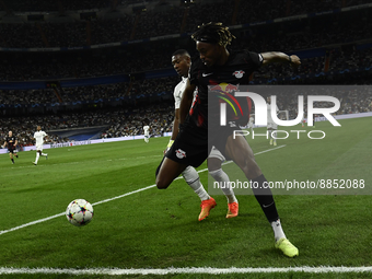 Mohamed Simakan centre-back of RB Leipzig and Franceand David Alaba centre-back of Real Madrid and Austria compete for the ball during the U...