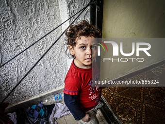 A Syrian boy in a Hotel in Kos, on November 1, 2015. Many Syrians living around the Island of Kos Greece in hotels as the tourist season end...
