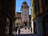 A view of Torre della Campanella or Torre della Cittadella, ancient military tower with the clock by Bernabo Visconti (1323-1385), Cittadell...