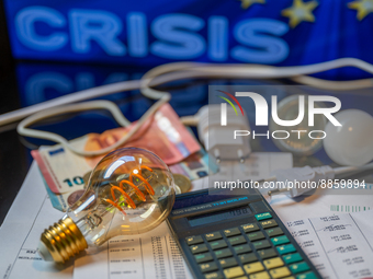 The price of electricity, electricity bill with money and light bulb. The European Union is preparing to take emergency action to reform its...