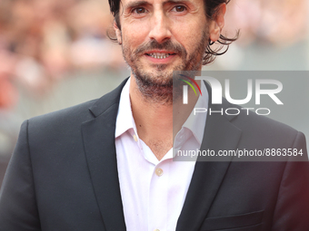 Director Juan Diego Botto poses upon his arrival at the presentation of the film 'On the Fringe' at the San Sebastian International Film Fes...