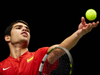 Carlos Alcaraz of Spain serves against Soonwoo Kwon of Republic of Korea during the Davis Cup Finals Group B Stage Men's Singles match betwe...