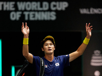 Soonwoo Kwon of Republic of Korea waves his hands to the crowd following his defeat against Carlos Alcaraz of Spain during the Davis Cup Fin...