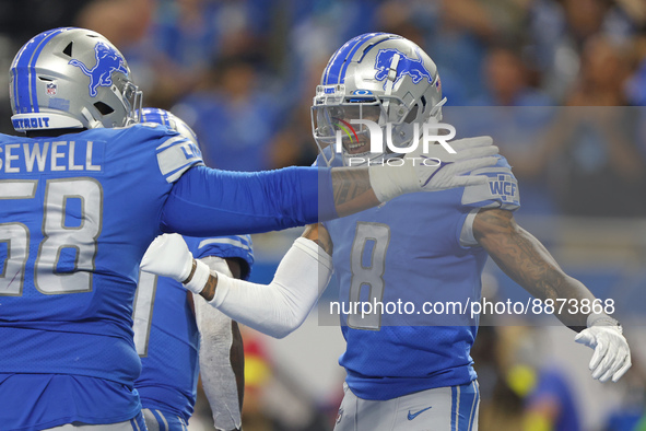 Detroit Lions wide receiver Josh Reynolds (8) celebrates his touchdown during the first half of an NFL football game against the Washington...