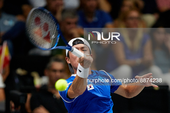 Seong Chan Hong of Republic of Korea in action against Roberto Bautista Agut of Spain during the Davis Cup Finals Group B Stage Men's Single...