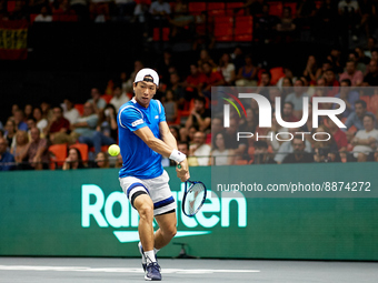 Seong Chan Hong of Republic of Korea in action against Roberto Bautista Agut of Spain during the Davis Cup Finals Group B Stage Men's Single...
