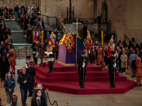 Members of the public stand in the queue for the Lying-in State of Queen Elizabeth II on September 18, 2022, in London, England. Queen Eliza...