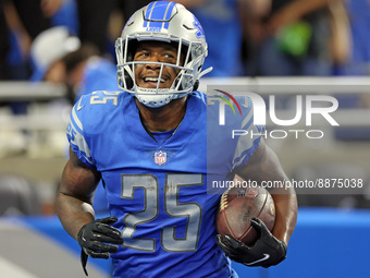 Safety Will Harris (25) of the Detroit Lions runs on the field with the ball after a play during an NFL football game between the Detroit Li...
