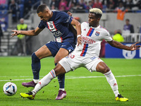Kylian MBAPPE of PSG and Thiago MENDES of Lyon during the French championship Ligue 1 football match between Olympique Lyonnais and Paris Sa...
