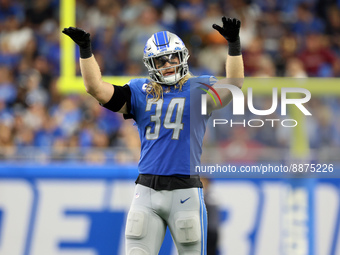 Linebacker Alex Anzalone (34) of the Detroit Lions gestures to the crowd during a stop in play during an NFL football game between the Detro...