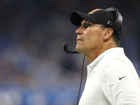 Washington Commanders head coach Ron Rivera follows the play during the second half of an NFL football game against the Detroit Lions in Det...