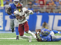 Washington Commanders wide receiver Terry McLaurin (17) runs the ball during the second half of an NFL football game against the Detroit Lio...